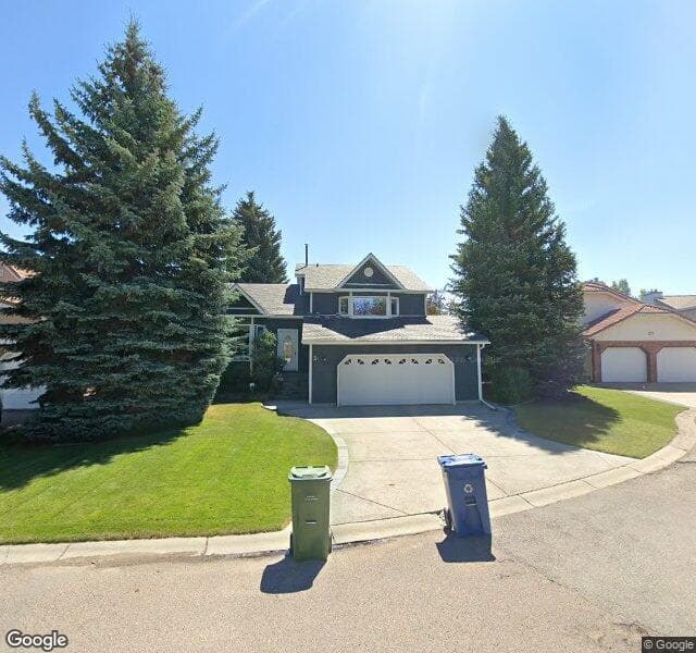 Street view of 31 Strathcanna Court SW, Calgary
