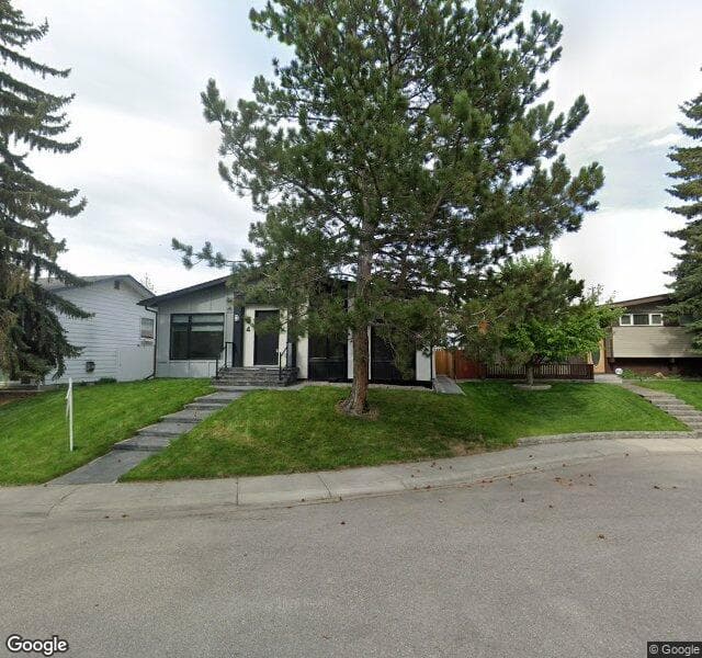 Street view of 64 Maple Court Crescent SE, Calgary