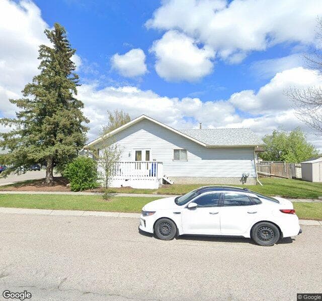 Street view of 4 Millcrest Place SW, Calgary