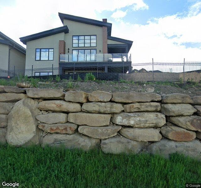 Street view of 220 Elveden Court SW, Calgary