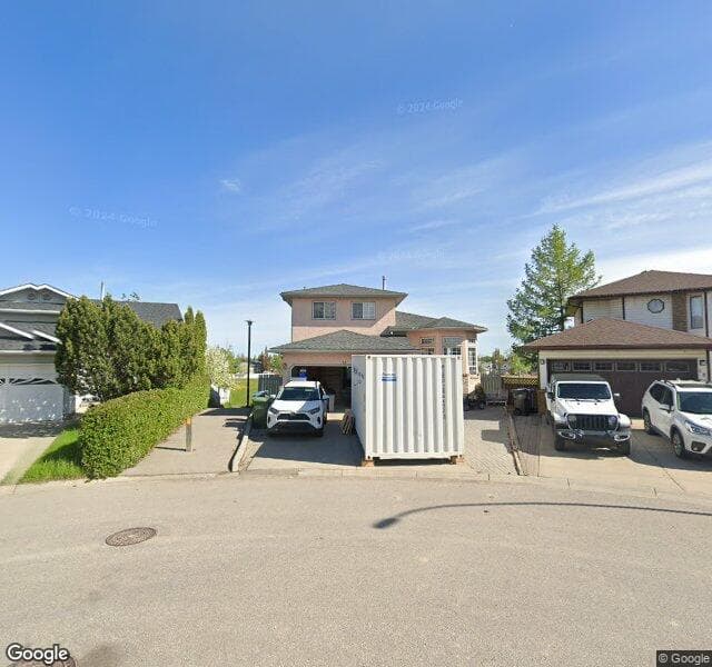 Street view of 77 Riverglen Close SE, Calgary