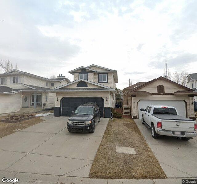 Street view of 118 River Rock Crescent SE, Calgary