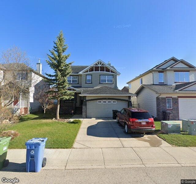 Street view of 86 Cougarstone Terrace SW, Calgary