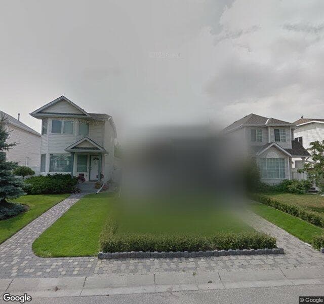Street view of 21 Rivercrest Close SE, Calgary