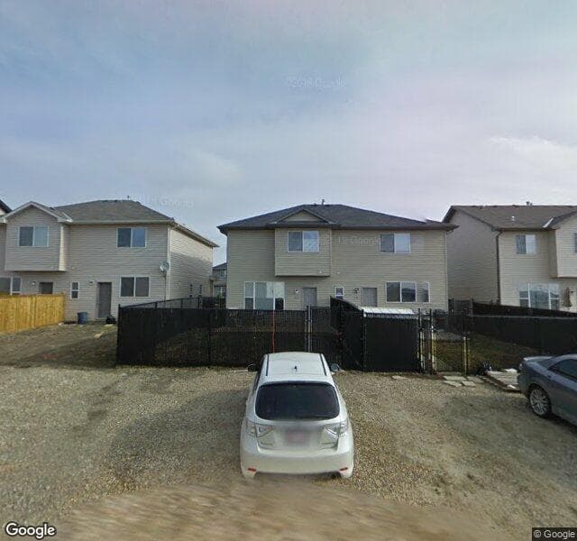 Street view of 23 Covehaven Mews NE, Calgary