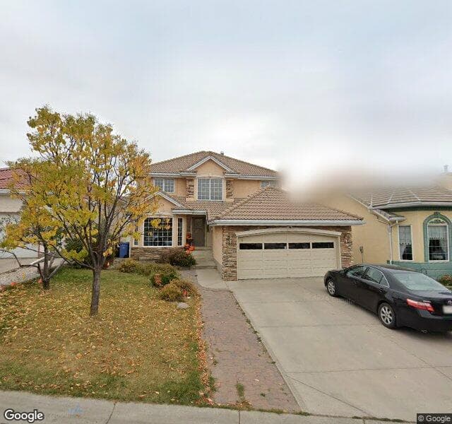 Street view of 218 Signature Close SW, Calgary