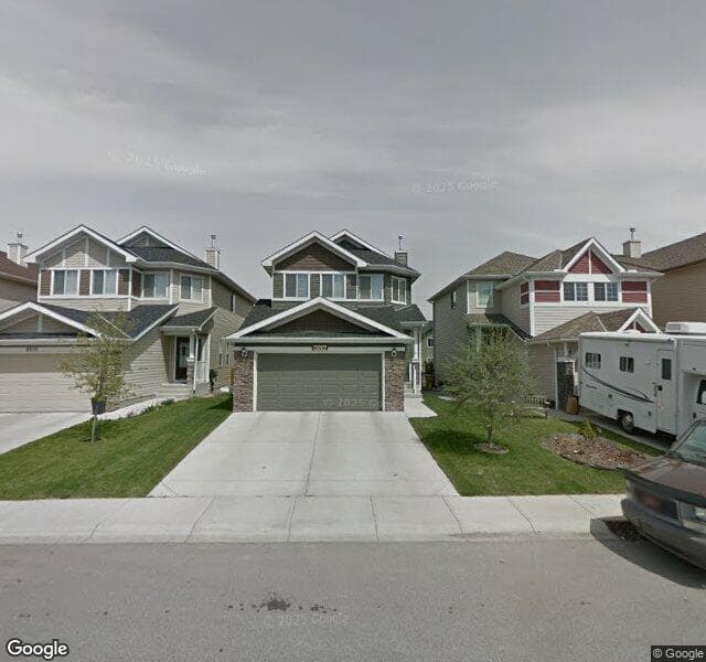 Street view of 8006 Cougar Ridge Avenue SW, Calgary