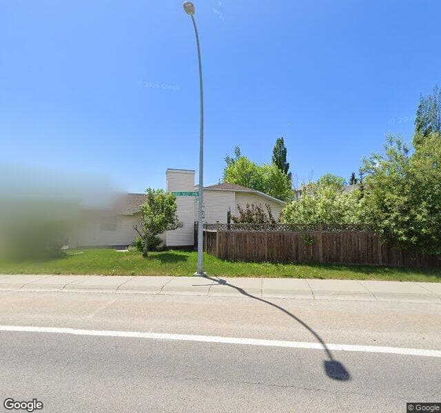 Street view of 404 Hidden Vale Place NW, Calgary