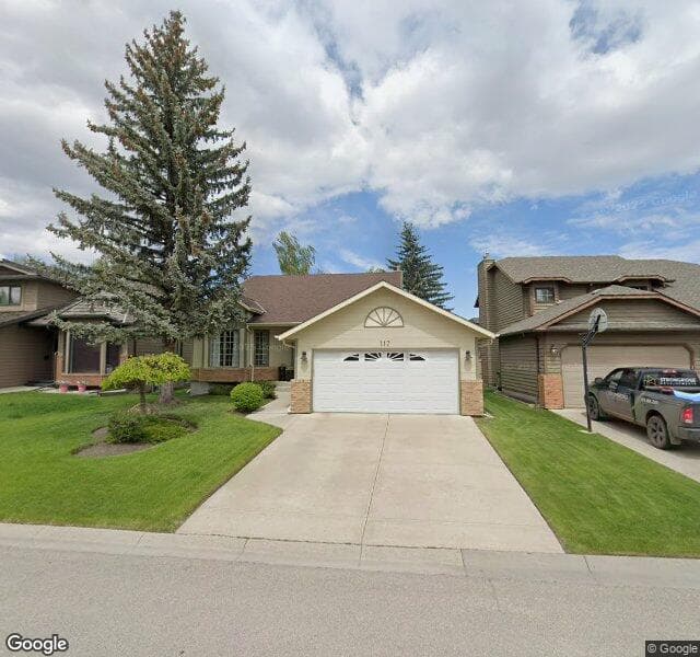 Street view of 117 Deer River Place SE, Calgary