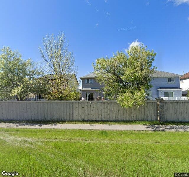 Street view of 103 Somerside Common SW, Calgary
