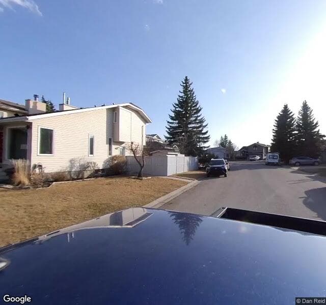 Street view of 218 Rivergreen Place SE, Calgary