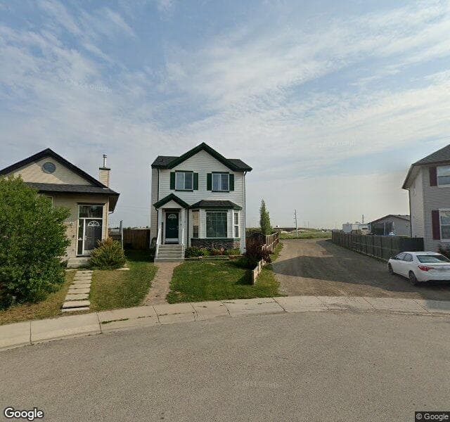 Street view of 221 Cramond Close SE, Calgary