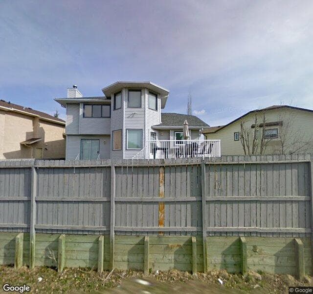 Street view of 32 Harvest Wood Place NE, Calgary