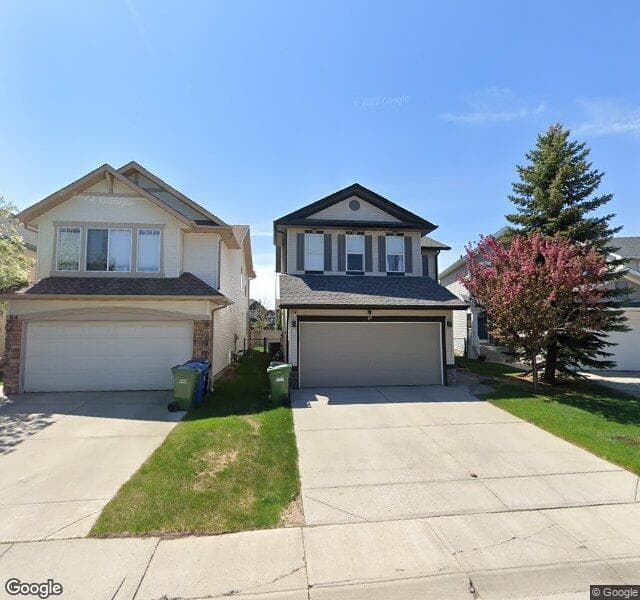 Street view of 88 Cougarstone Square SW, Calgary