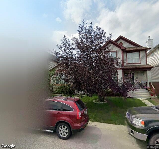 Street view of 98 Tuscany Ridge Common NW, Calgary