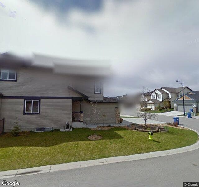 Street view of 101 Cougarstone Manor SW, Calgary