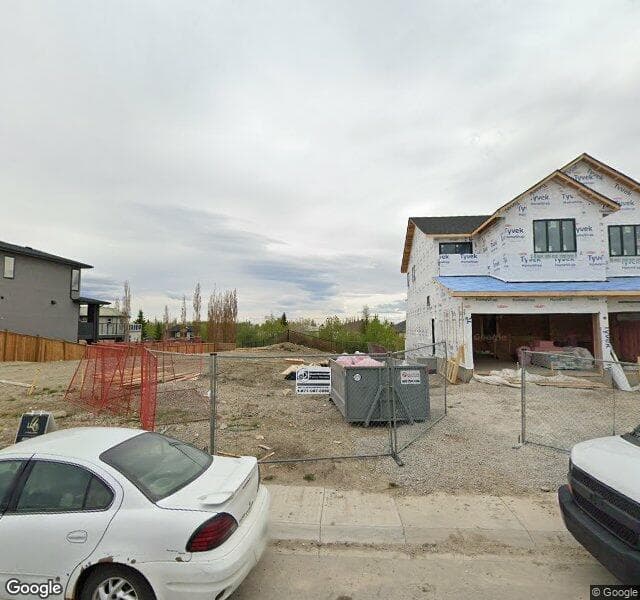 Street view of 100 Rock Lake View NW, Calgary