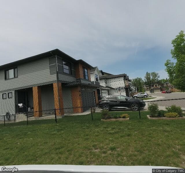 Street view of 242 Harvest Hills Court NE, Calgary
