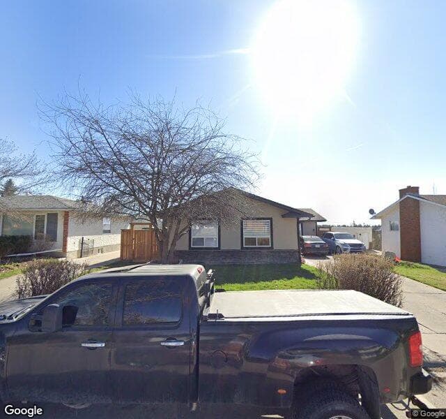 Street view of 236 Lake Wapta Rise SE, Calgary
