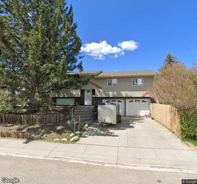 Street view of 7055 Huntbourne Road NE, Calgary