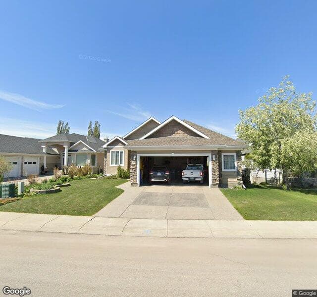 Street view of 147 W Springs Place SW, Calgary