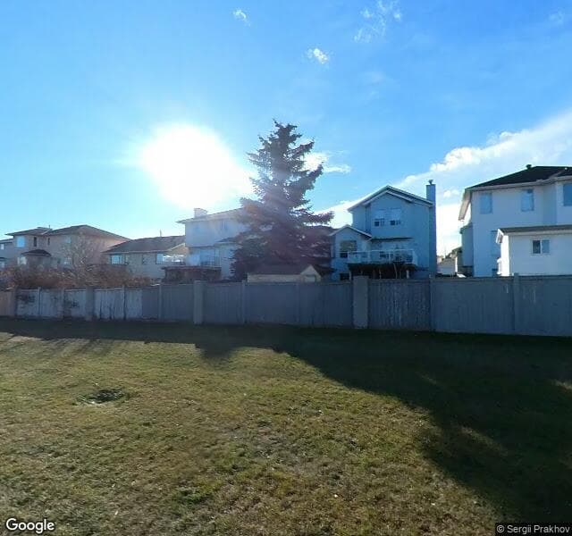 Street view of 638 Hidden Vale Place NW, Calgary