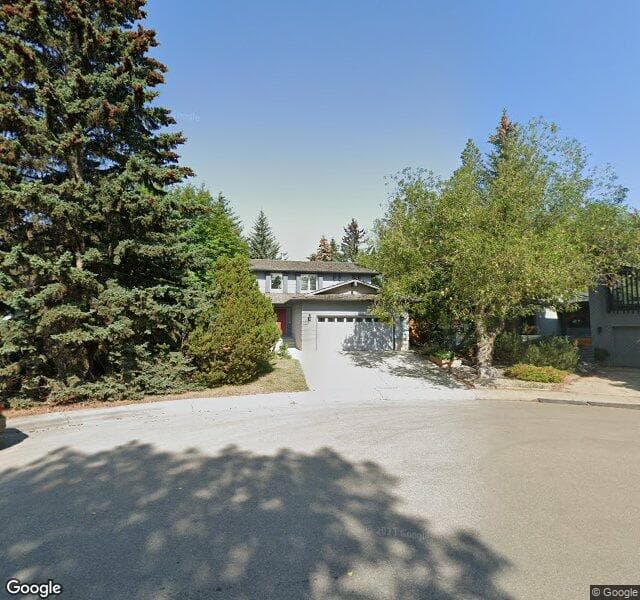 Street view of 403 Oakside Circle SW, Calgary