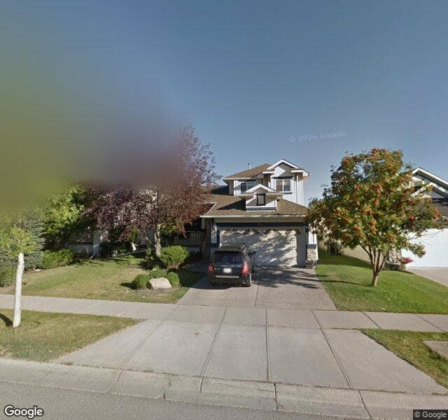 Street view of 64 Chaparral Drive SE, Calgary