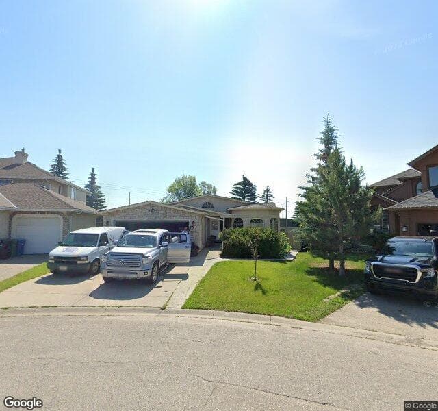 Street view of 75 Mckenzie Lake Manor SE, Calgary