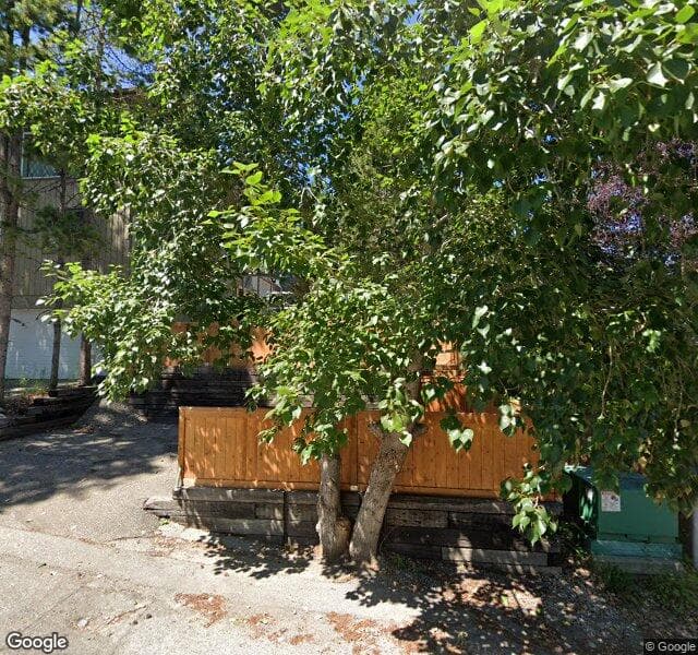 Street view of 215 Coach Side Road SW, Calgary