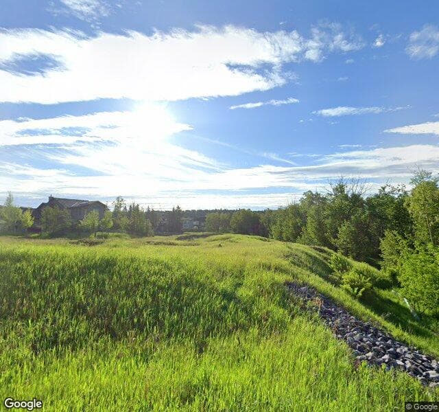 Street view of 161 Mystic Ridge Common SW, Calgary