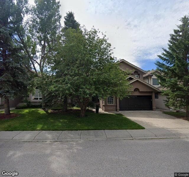 Street view of 102 Suncanyon Park SE, Calgary