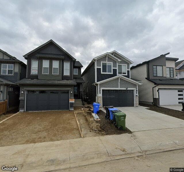 Street view of 23 Silver Spruce Grove SW, Calgary