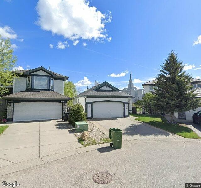 Street view of 256 Rocky Ridge Bay NW, Calgary