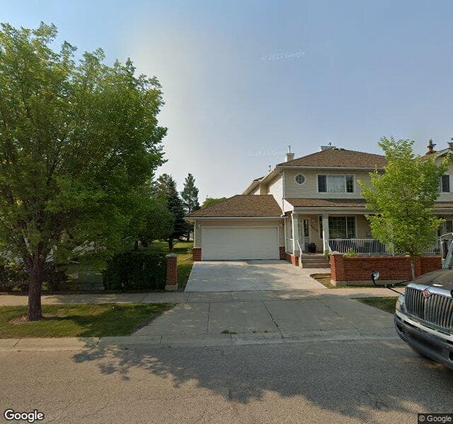 Street view of 1005 Sierra Morena Park SW, Calgary