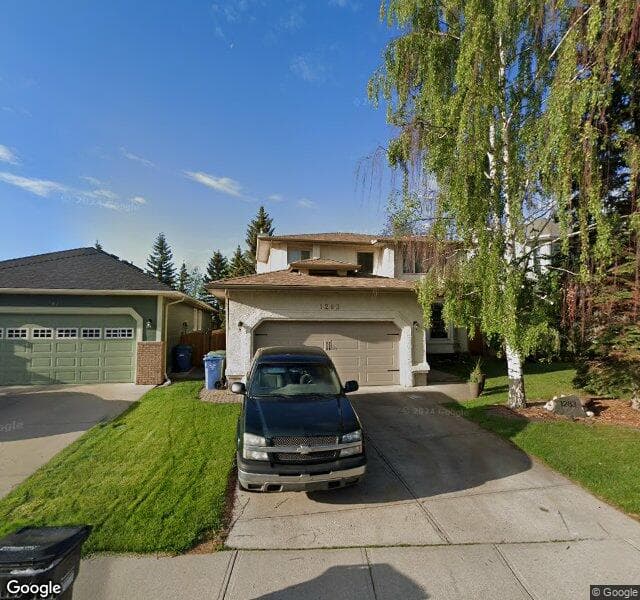 Street view of 1283 Sunvista Way SE, Calgary