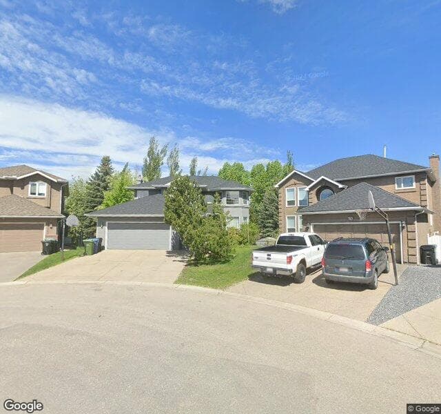 Street view of 739 Mckenzie Lake Bay SE, Calgary