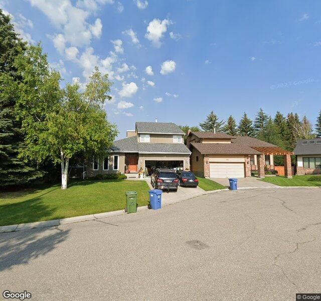 Street view of 56 Woodcroft Place SW, Calgary