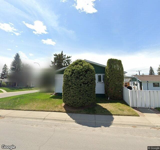 Street view of 2216 Munro Drive NE, Calgary