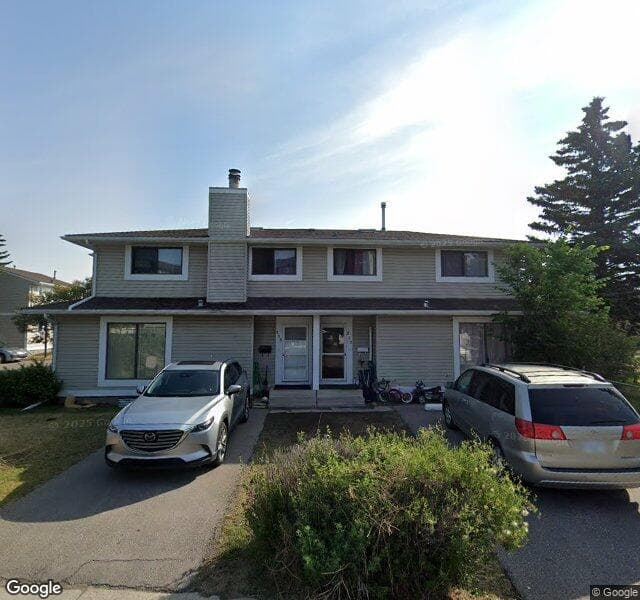 Street view of 313 Pinestream Place NE, Calgary