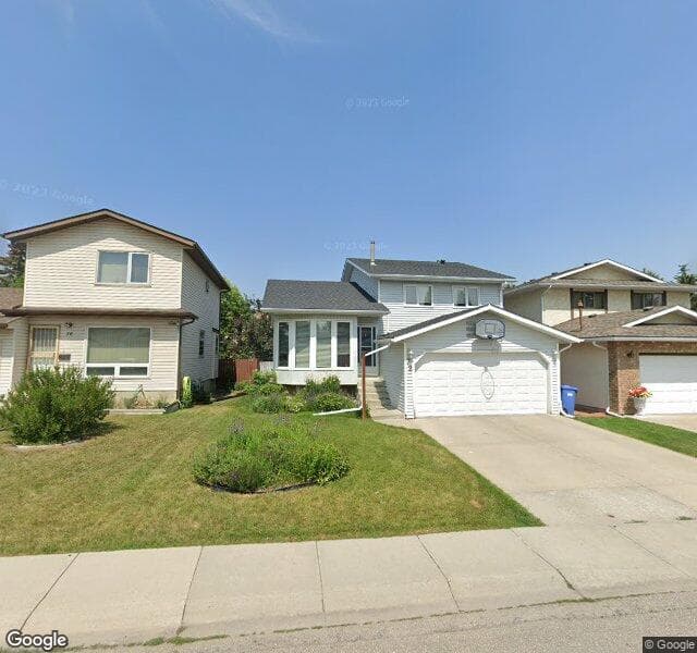 Street view of 72 Woodstock Road SW, Calgary
