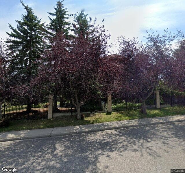 Street view of 103 Pumpmeadow Place SW, Calgary