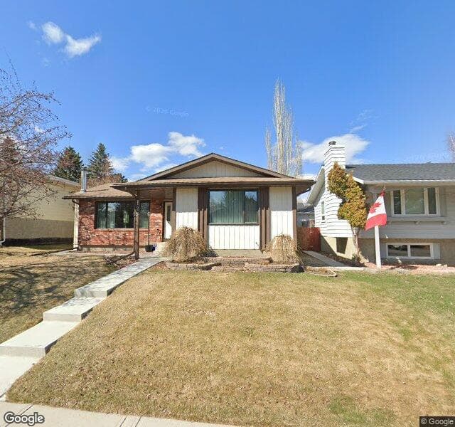 Street view of 128 Deercrest Close SE, Calgary