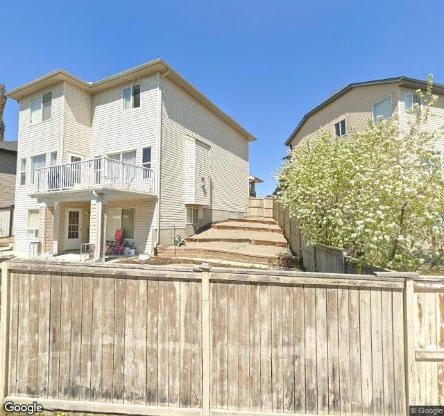Street view of 153 Panamount Place NW, Calgary