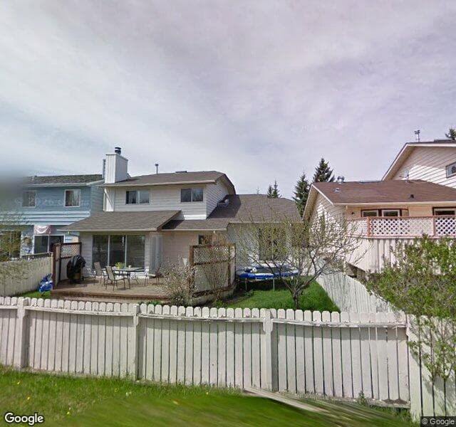 Street view of 64 Woodglen Way SW, Calgary
