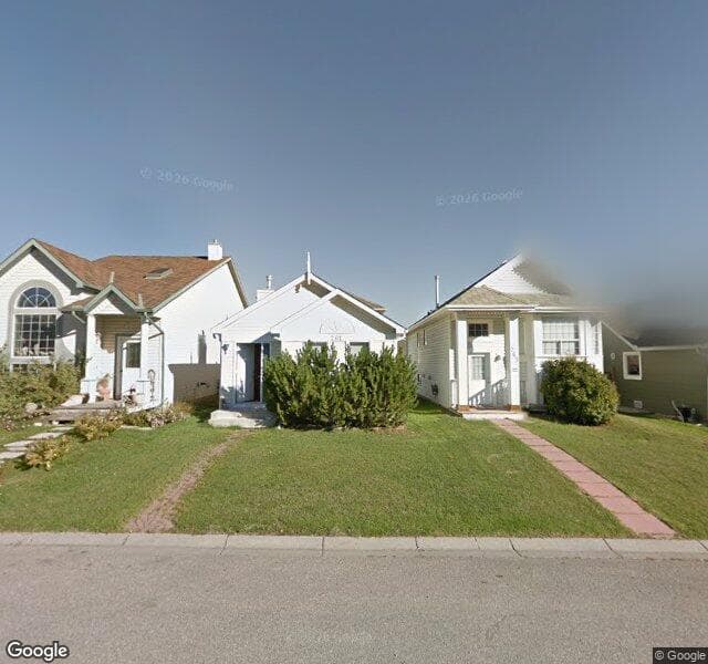 Street view of 261 Hidden Spring Green NW, Calgary