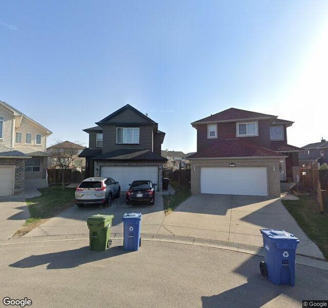 Street view of 323 Saddlecreek Point NE, Calgary