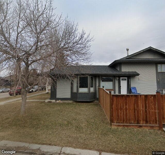 Street view of 932 Riverbend Drive SE, Calgary