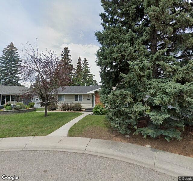 Street view of 30 Lake Christina Close SE, Calgary