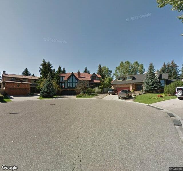 Street view of 316 Coach Grove Place SW, Calgary